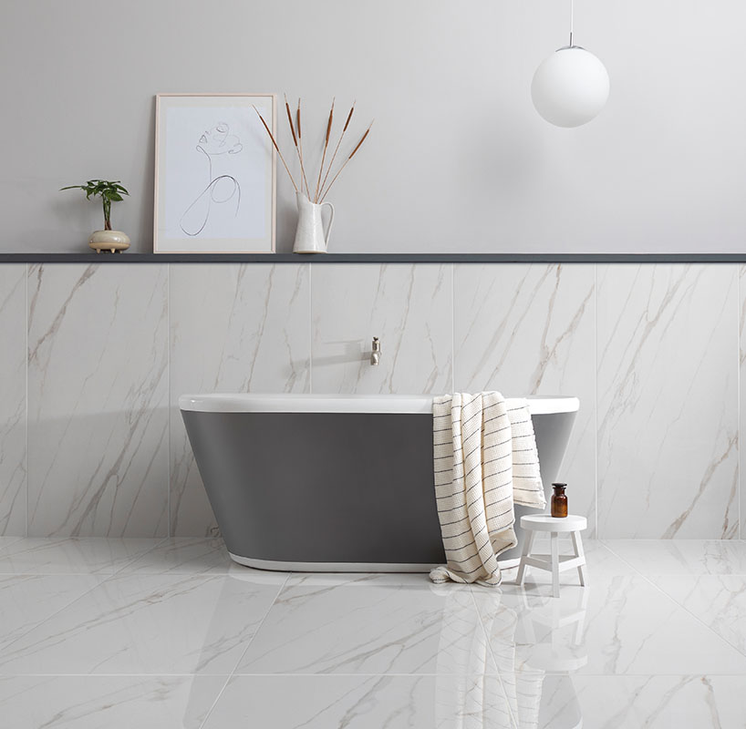 marble tile in bathroom with freestanding bath