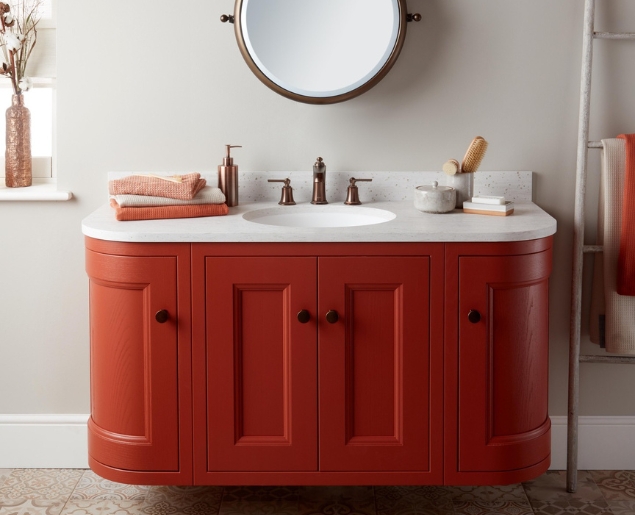 Curved wall hung vanity unit in terracotta